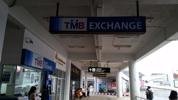 Phuket Airport International TMB Bank Sign The Exit area from terminal building at Phuket International showing TMB Exchange sign